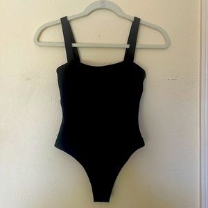 Wanderlust cheeky black one peice